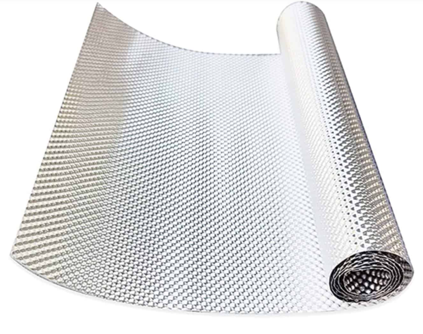Reflective thermoplastic roofing sheet roll with heat-shield surface used to reduce solar heat in buildings